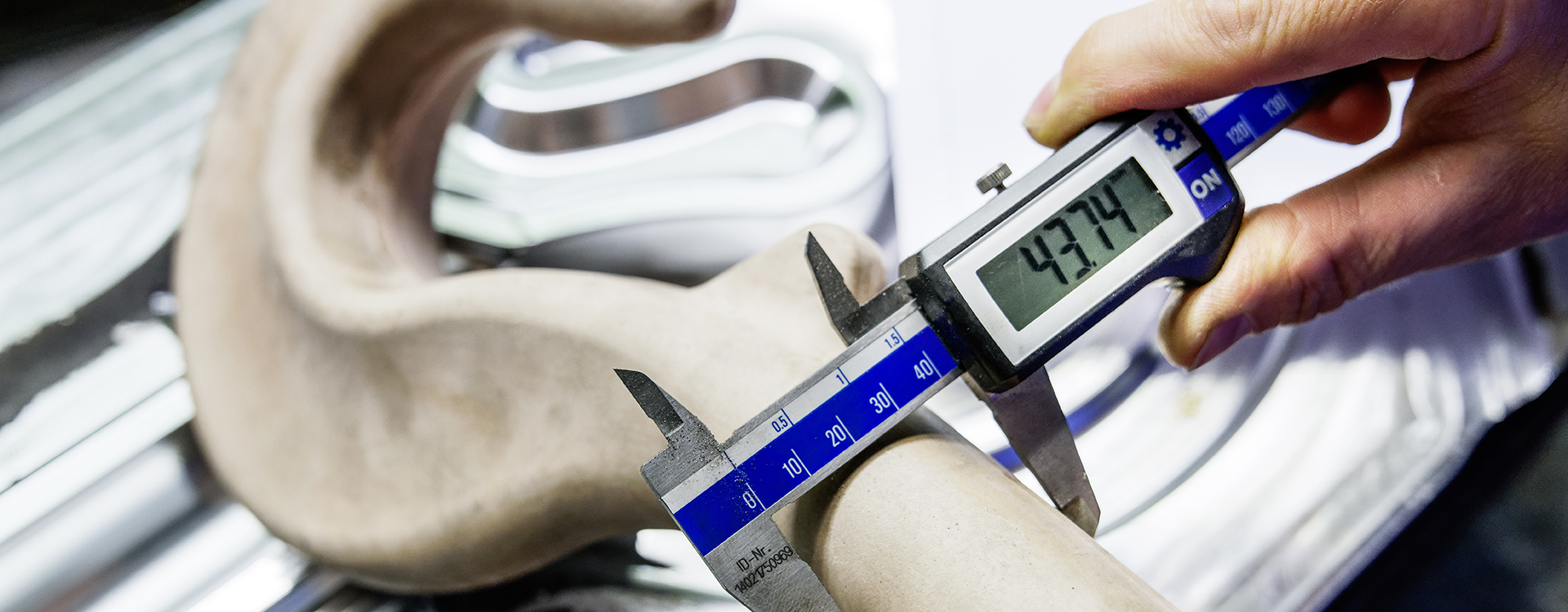 Qualitätsprüfung Lasthaken.